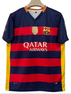 Barcelona football jersey with Nike logo and Qatar Airways branding on a hanger.